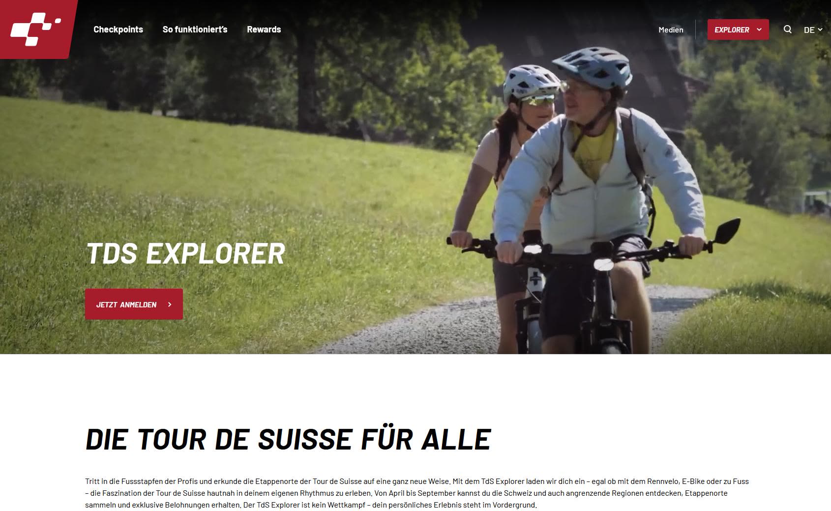 Screenshot der TdS-Explorer-Webseite mit zwei Velofahrenden auf einem Feldweg