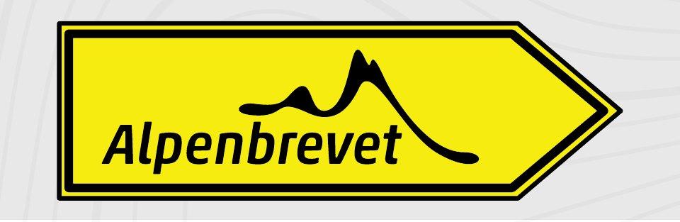Gelber Alpenbrevet-Richtungspfeil